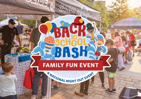 Back to School Bash emblem features children playing in the splashpad, snow cone, balloon animal, and a police & fire hat.